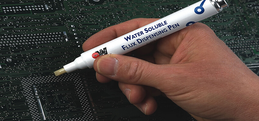 Water soluble flux dispensing pen